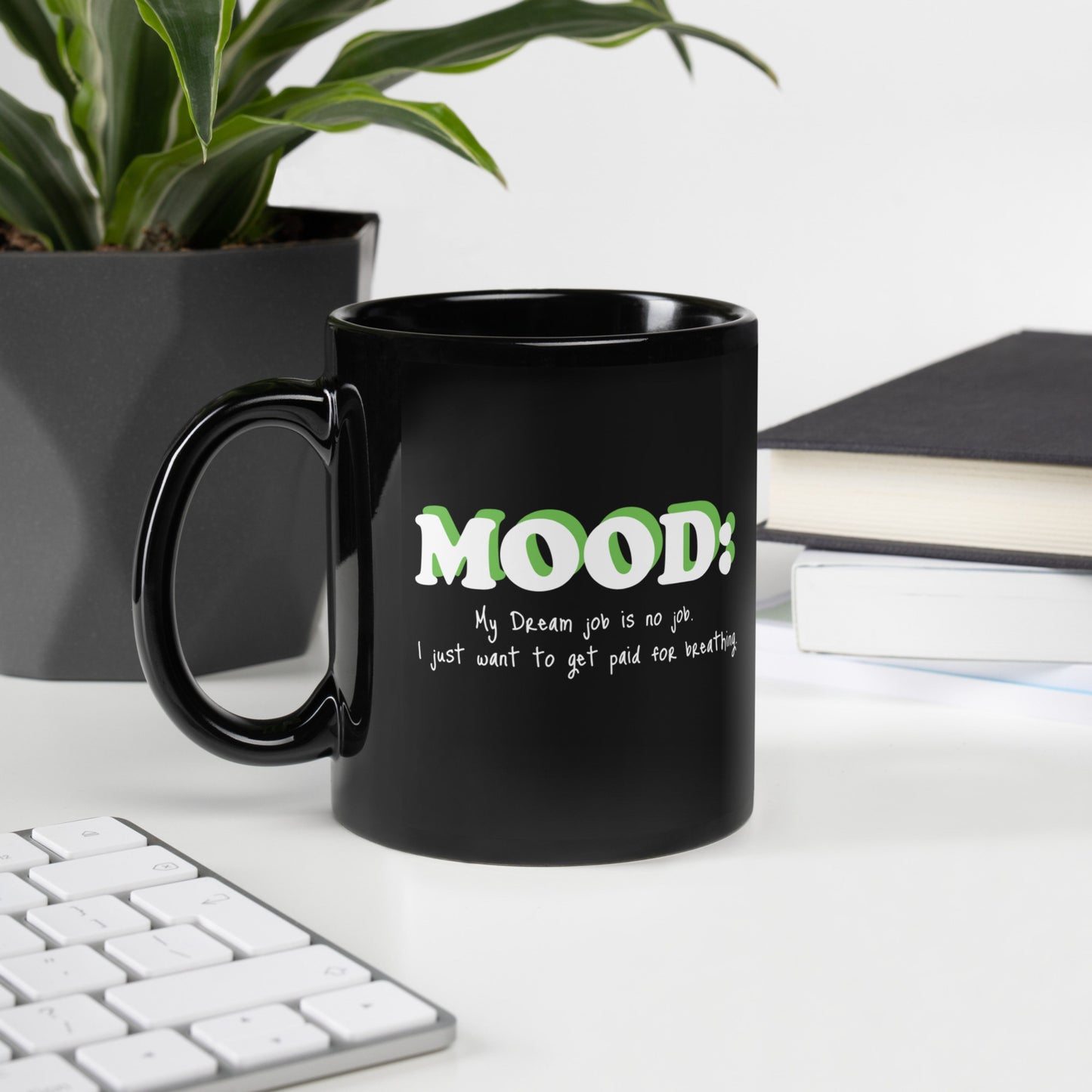 Black ceramic mug with bold “Mood” text design, perfect for coffee and tea lovers